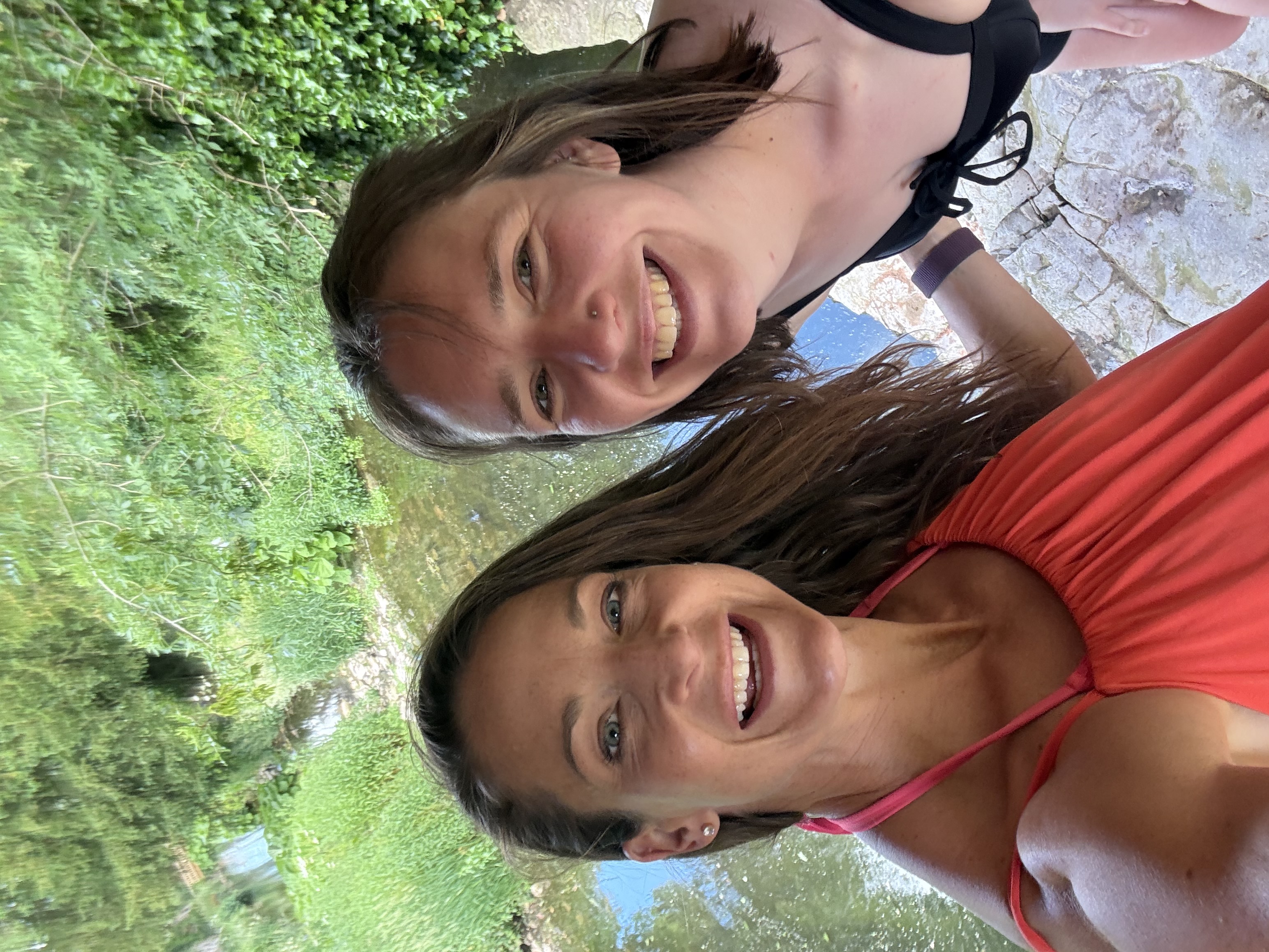 Jen Slade smiling by a river