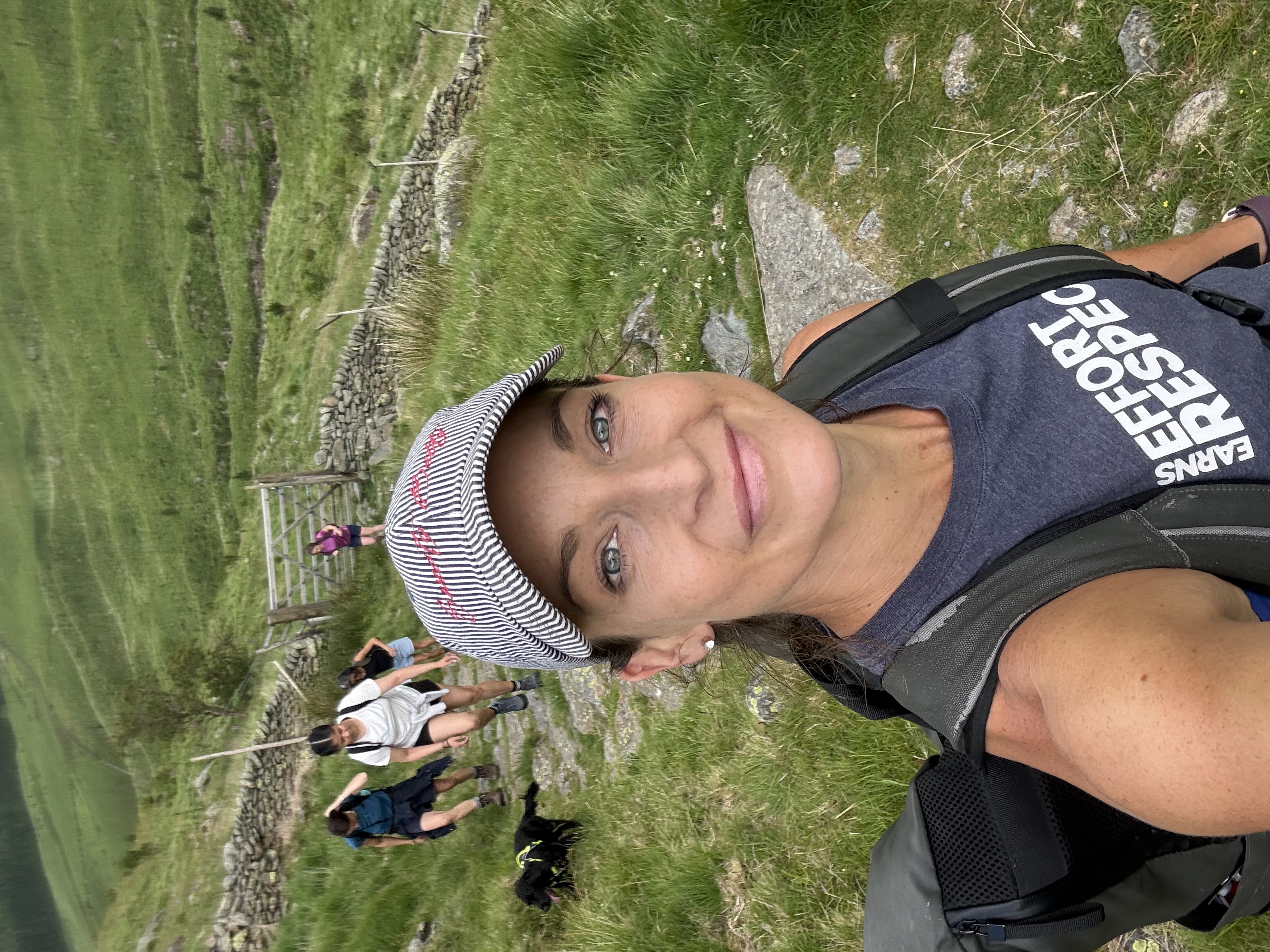 Liz Marsland leading a group hike up a fell in the Lake District